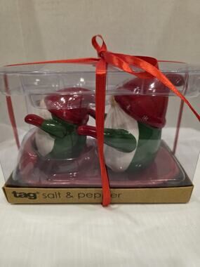 Tag sledding Christmas Gnomes salt and pepper set new in box. ~ 4" and 3" T